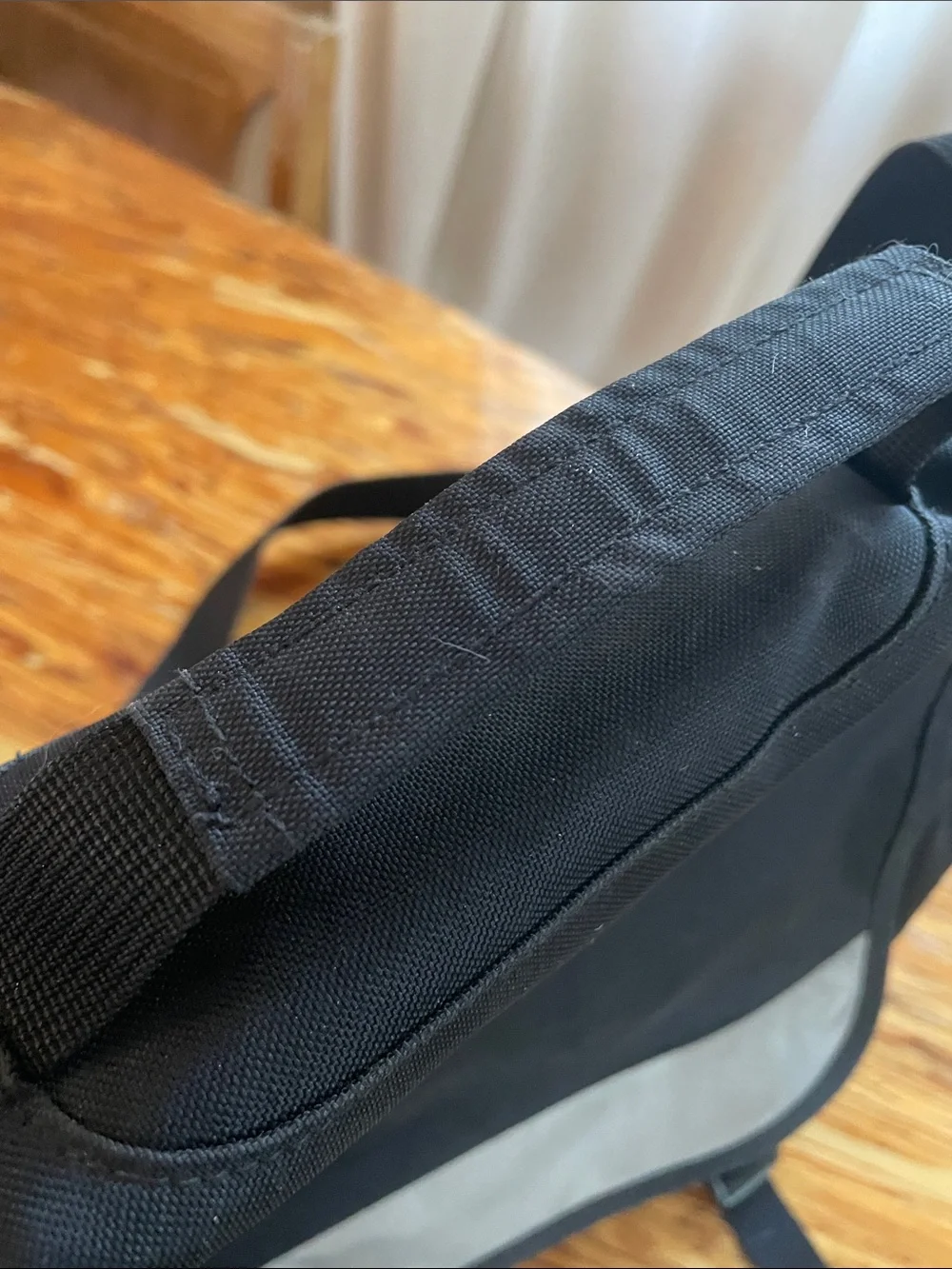Patagonia Black Messenger Bag with Reflective Accent